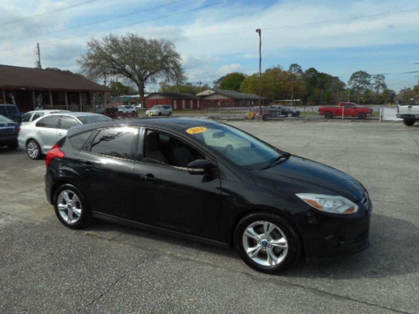 2014 BLACK FORD FOCUS SE (1FADP3K25EL) , located at 10405 Abercorn Street, Savannah, GA, 31419, (912) 921-8965, 31.988262, -81.131760 - Photo#2